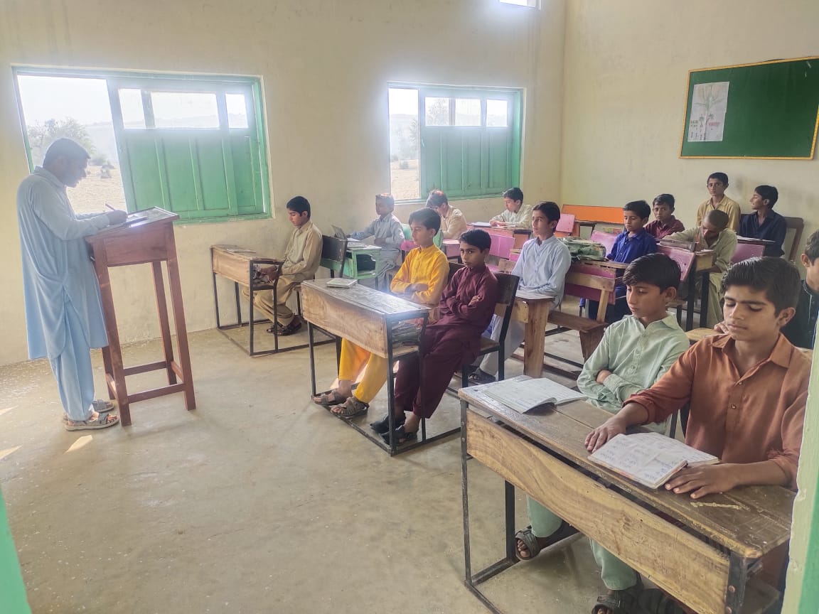 Children reading in an ECS classroom